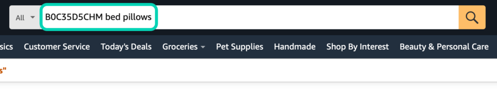 Amazon search bar with a product "bed pillows" entered, demonstrating specific item search.